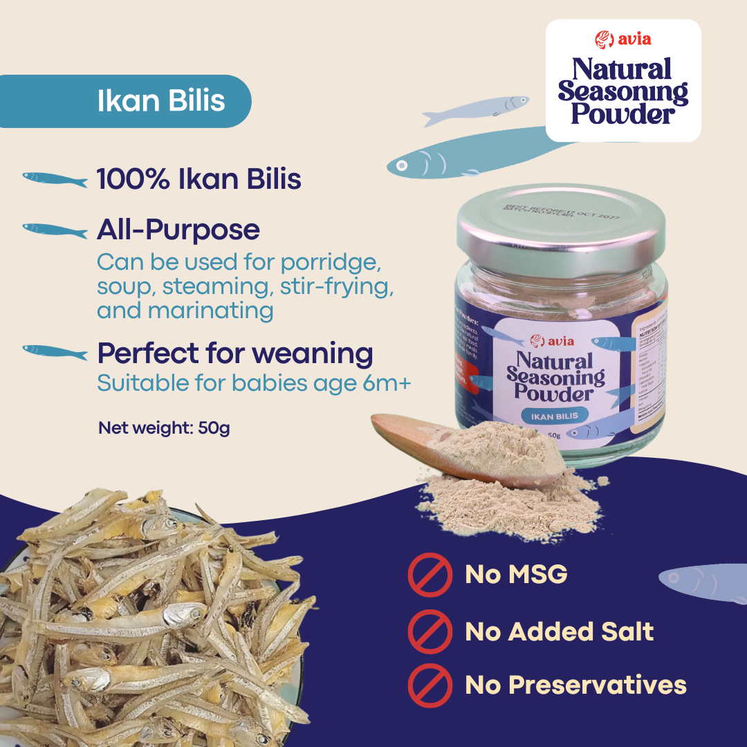 A promotional product graphic for Avia Ikan Bilis Natural Seasoning Powder. The image features a jar of the seasoning powder, a wooden spoon filled with the seasoning powder, and a pile of dried fish on the bottom left. Highlighting the USP made from 100% ikan bilis with no MSG, no added salt, no preservatives, and suitable for weaning age 6 months and above