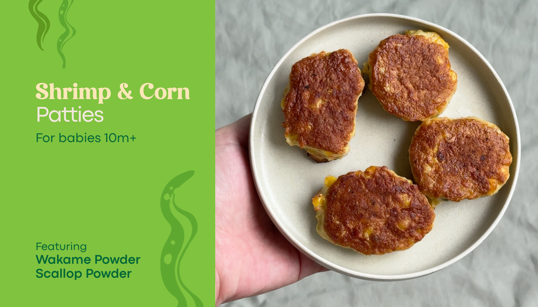 Shrimp and Corn Patty on a white plate with text "For babies 10m+" and "Featuring wakame powder and scallop powder"